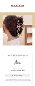 Detail of 12cm silver liquid metal bow hair claw clip with large pearl accent
