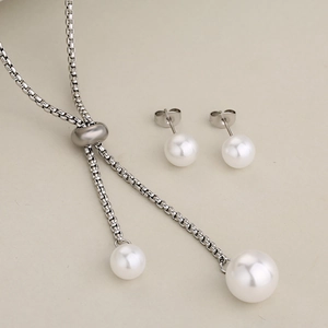 Silver stainless steel jewelry set with adjustable pearl necklace and matching stud earrings