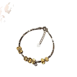 Elegant citrine beaded bracelet with silver chain, heart charm and zircon accents