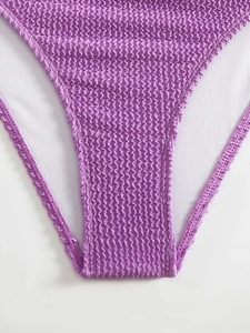 Detail of lavender purple seersucker bikini bottoms with textured fabric and soft lining