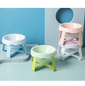 Elevated ceramic cat bowls with wavy edges and cross stands in various pastel colors