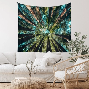 Detail of forest trees tapestry background in a cozy Nordic living room setting