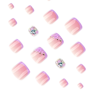 French purple gradient press-on toenails with floral designs and sparkling rhinestones