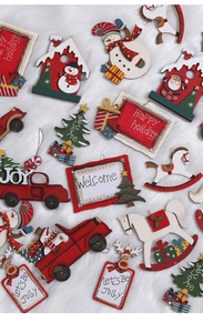Detailed flat lay of festive wooden Christmas ornaments on white faux fur background