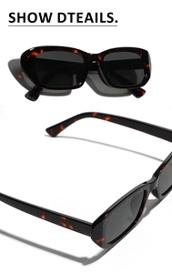 Detailed close-up of retro tortoiseshell sunglasses with dark lenses and rectangular frame
