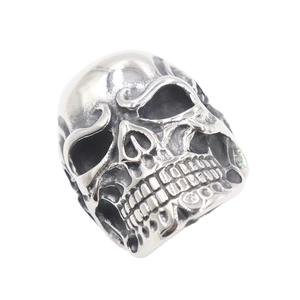 Vintage stainless steel skull ring with distressed silver finish and gothic details
