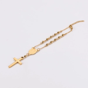 Minimalist gold stainless steel beaded bracelet with cross and religious medal pendants