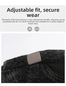 Detail of adjustable metal buckle and thick faux fur texture on black winter baseball cap