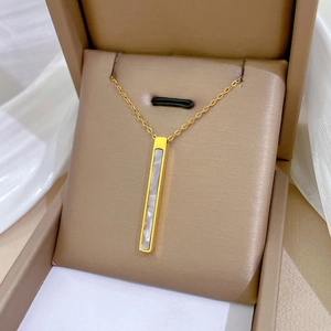 Golden titanium steel bar necklace with white shell inlay in a premium jewelry box