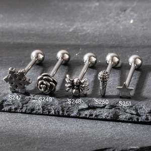 Assorted stainless steel cartilage studs with snowflake skull flower and star designs