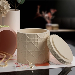 Cylindrical silicone mold for DIY storage jar featuring a relief woven texture pattern