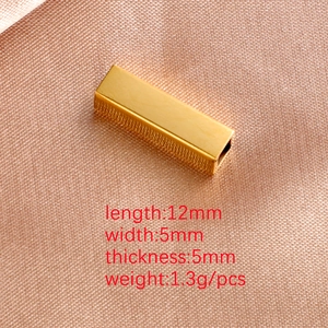 Macro detail of 12mm x 5mm gold stainless steel hollow bar bead for jewelry making