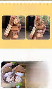 Detail of cute bubble tea cartoon keychain with silicone wristband and golden clasp