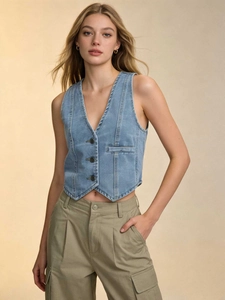 Women's casual blue denim vest with metal buttons and flap pockets in a cropped slim fit