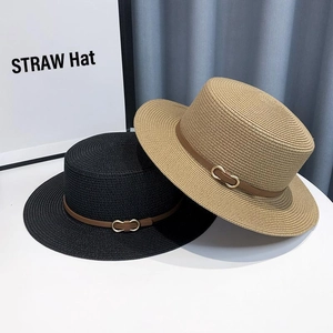 Flat top straw sun hats in black and khaki with leather bands and gold buckles
