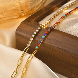 Detail of 18K gold stainless steel paperclip bracelets with white and colorful zircons
