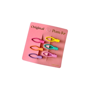 Set of 6 colorful macaron matte hair clips for kids on a pink card packaging