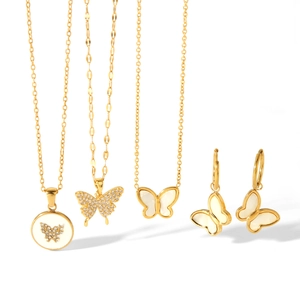 Golden butterfly jewelry set with mother of pearl necklaces and matching stud earrings