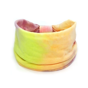Detail of bohemian tie-dye cotton headband showing soft fabric texture and gradient colors