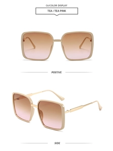 Vista detallada de gafas de sol cuadradas de gran tamaño con lentes degradadas de color rosa té