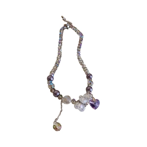 Purple crystal beaded necklace featuring a cute bear charm and heart pendant with extension chain