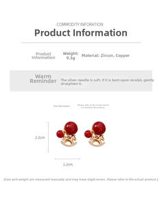 Detailed view of rocking horse earrings with red beads and zircon gold plated finish