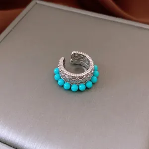 Vintage silver hollow ear cuff with turquoise blue beads in a premium jewelry gift box