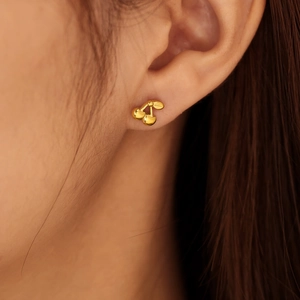 Elegant gold cherry earrings for women made of minimalist polished stainless steel