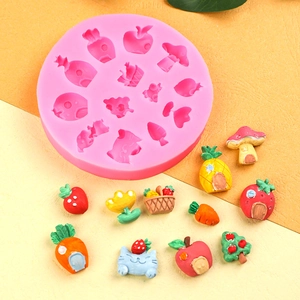 Pink silicone mold with strawberry fruit house shapes for fondant and resin crafts