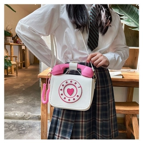 Creative vintage telephone-shaped crossbody bag in white and pink PU leather for women