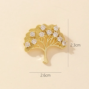 Detailed view of Tree of Life pendant with dimensions 2.6cm by 2.3cm and gold plating