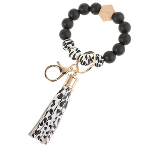 Silicone and wooden bead wristlet keychain with leather tassel and gold ring