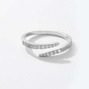 Macro shot of silver adjustable S925 ring with sparkling zircon stones detailing