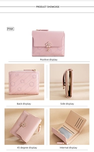 Pink faux leather wallet detail showing flower embroidery and metal charm with card slots