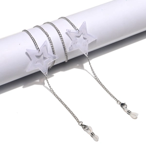 Silver metal eyewear chain with acrylic star pendants on a white minimalist display