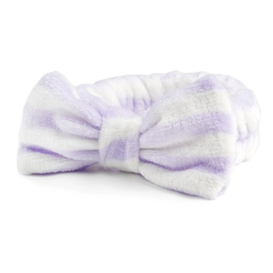 Detail van paars-wit gestreepte koraalvlies hoofdband met strik voor het wassen van gezicht