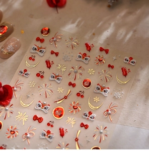 Detailed view of Chinese New Year nail stickers with lion dance and golden firework patterns