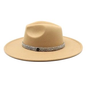 Detail of camel wool fedora with rhinestone band and M metal logo emblem
