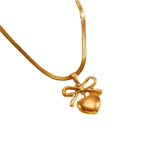 Golden titanium steel jewelry set with heart pendant and bowknot tassel necklace