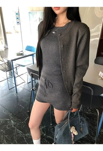 Three-piece dark grey knit set with long-sleeved cardigan, slim vest, and drawstring shorts