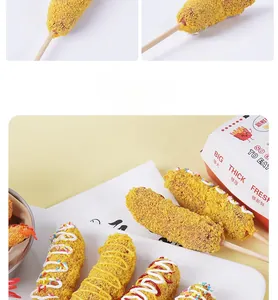 Macro shot of crispy golden breadcrumbs with colorful sprinkles and sauce on hot dog stick