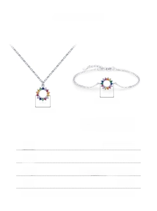 Detail of S925 sterling silver necklace and bracelet with rainbow gemstone circle charms