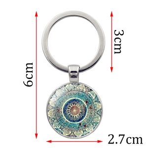 Portachiavi mandala fiore della vita in vetro con dimensioni 6cm x 3cm in blu