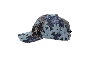 Detail of floral lace baseball cap for women with large rhinestone butterfly bow