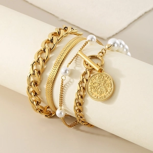 Gold-layered Cuban and snake chain bracelet set with pearl and sixpence coin charm