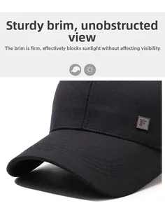 Close-up of black baseball cap featuring a stiff brim and square metal F logo detail