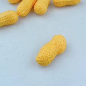 Macro shot of realistic peanut-shaped novelty stationery with detailed textured surface