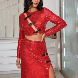 Detail of red sequin crop top and side slit skirt featuring black buckle accents