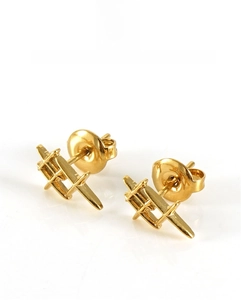 Detailed close-up of 18K gold-plated geometric stud earrings with butterfly backings