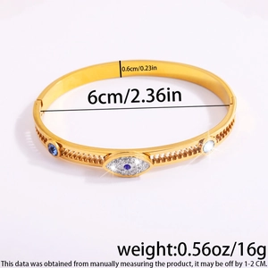 Detail view of gold stainless steel Evil Eye bangle with dimensions and weight specs